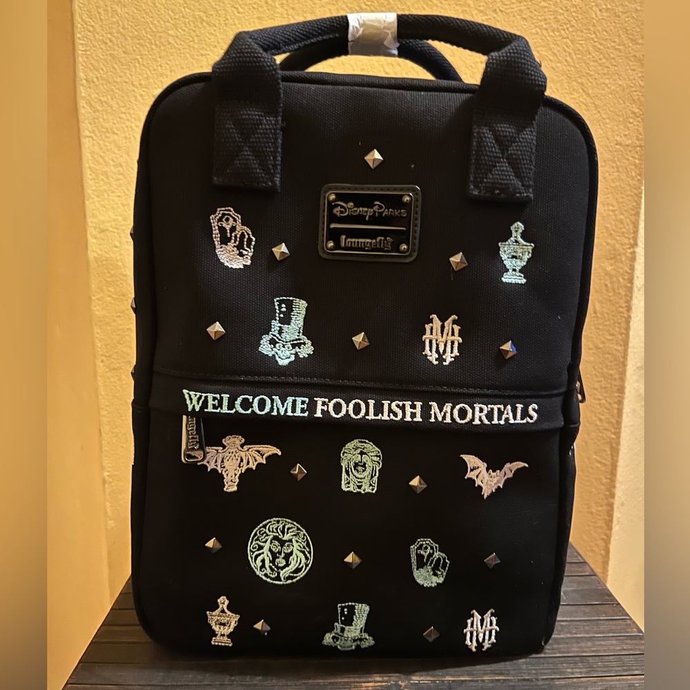 NWT Disney Parks exclusive Haunted Mansion Loungefly canvas backpack.
